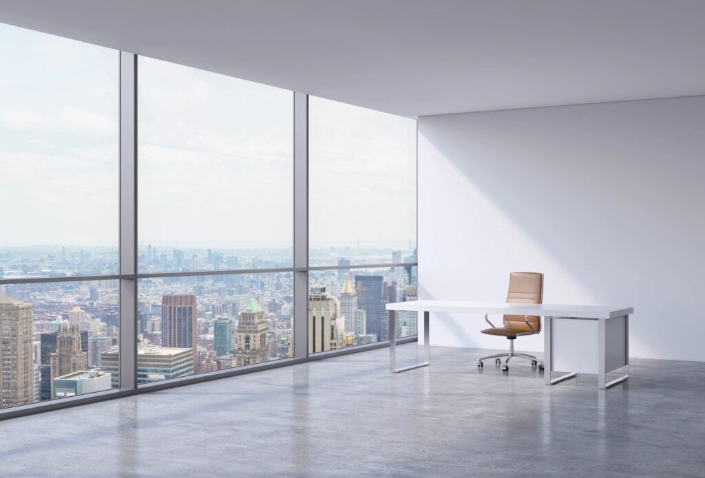 Empty office space with city views, ready for tenant finish-out